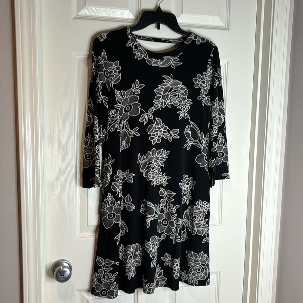 Black flower print long sleeve 95% polyester 5% spandex cut out back